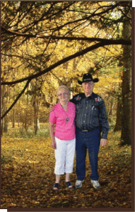 Joyce and Arie Schaly enjoy a walk with the fall colours.